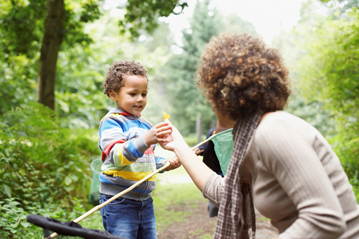 Special guardian image of a boy and woman in a park